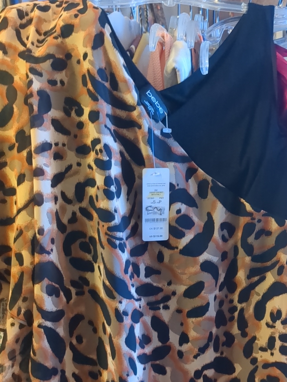 🧡bebe Asymmetrical Leopard Fluttered Mini Dress